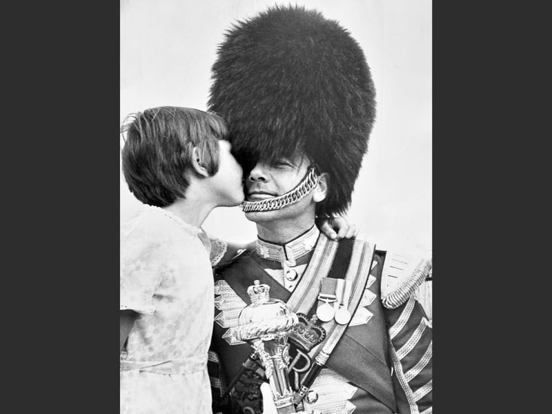The caption of this print is: 'An unexpected thank you for Drum Major Dixie Dean from Dawn Hinton (8), when she met the drum major after the display by the Band of the Grenadier Guards at Telford Super Saturday.' August 1978.