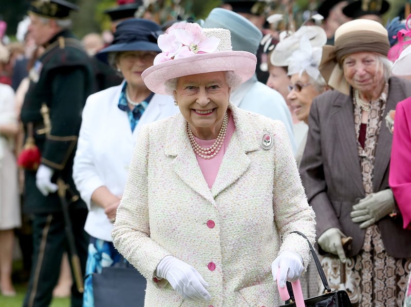 Denis Hodgkins, said: 'Queen Elizabeth in her Rolls Royce driving past my business Lytham Road Cars as I was washing my cars.'