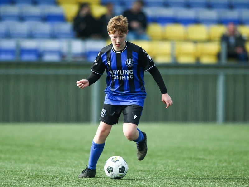 Action from the Portsmouth Youth League under-15 Campbell McFaull Invitation Cup Final between Cowplain Youth Spitfires and Hayling Youth Blues.