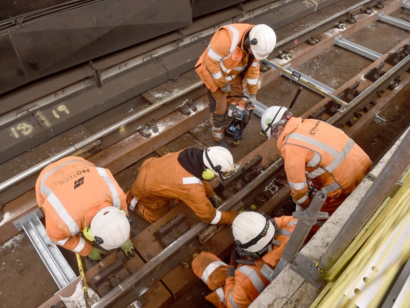 Network Rail engineers lay down new wheel timbers at Portsmouth & Southsea Station.