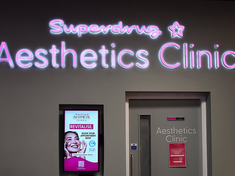 It includes professional treatments such as a Nail Bar, Brows & Lashes station, and Piercing services.