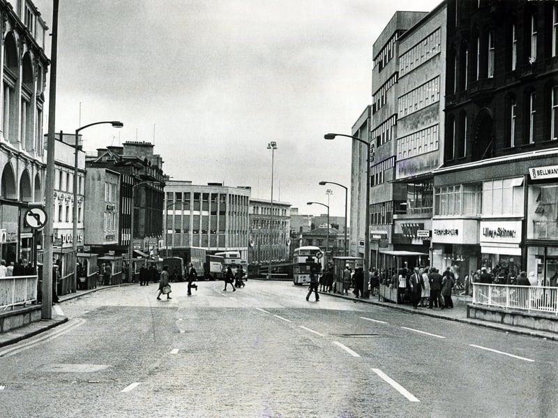 High Street, Sheffield, in 1973, with shops including Saxone, Lilley & Skinner, Bellmans, Hector Powe, Dolcis, C&A and Peter Robinson
