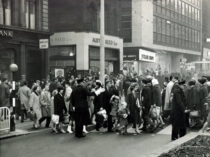 A busy Fargate, Sheffield, in 1965, showing the Austin Reed menswear and Richard's ladies fashion shops