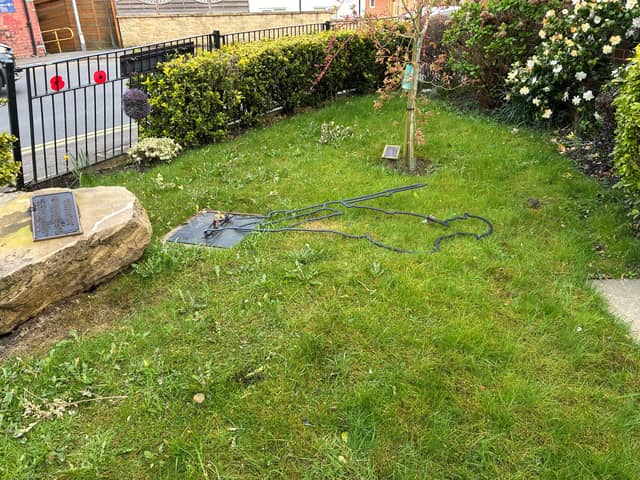 The remembrance stone and soldier silhouette knocked over 