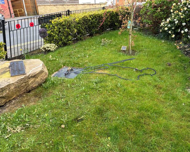The remembrance stone and soldier silhouette knocked over 