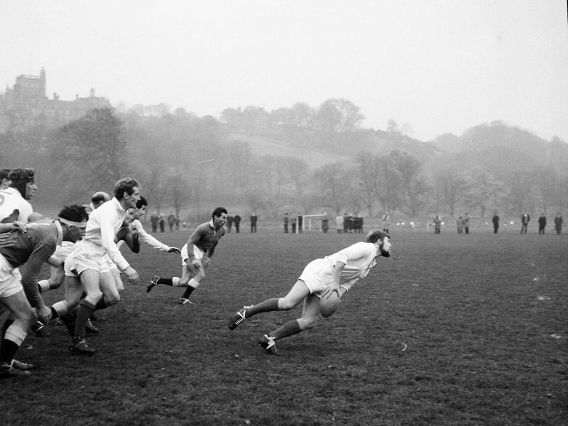 JP Hartley for Edinburgh passes the ball out from a loose maul at the Edinburgh University versus Co-Optimists rugby match at Craiglockhart in November 1964.