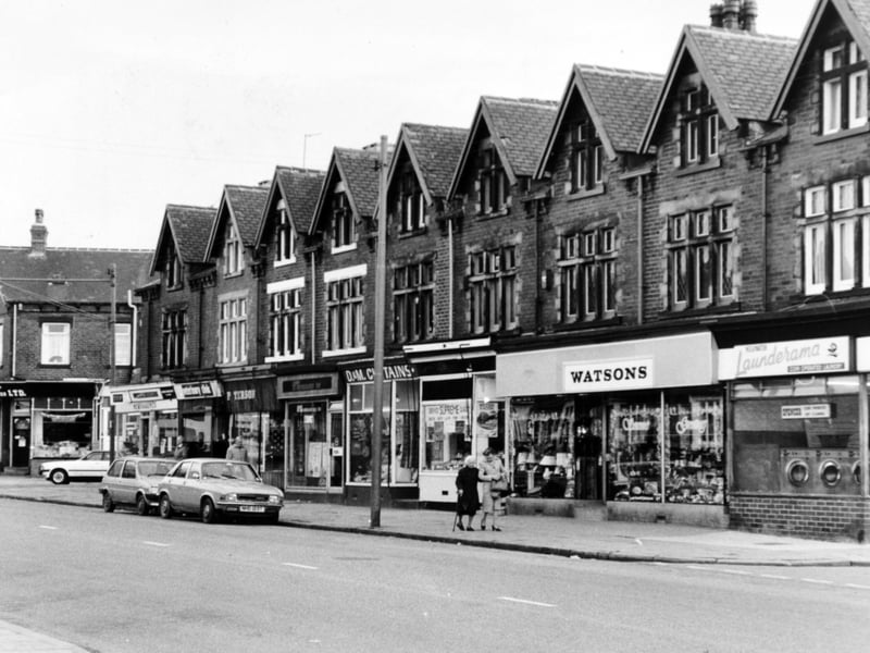 Shops, including Watsons, on Beeston Road, Leeds, in December 1984
