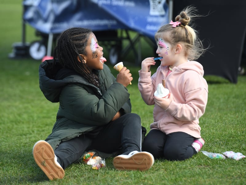  6-year-old Amaya Jeffers and 4-year-old Arla Quinn enjoy an ice cream at the festival