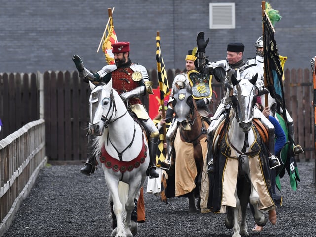 Knights waving to the crowd 