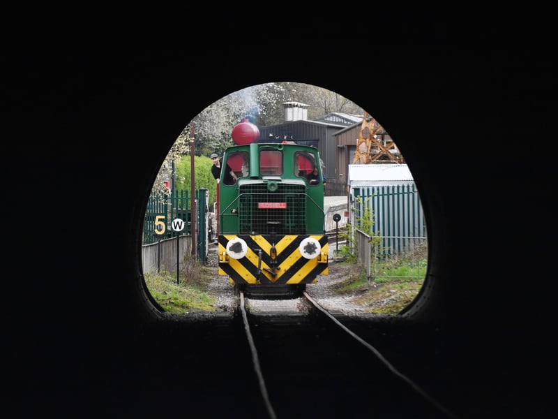 The Hudswell diesel locomotive makes its first journey of the season.