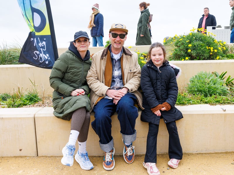 Jayne and Mila found an orange coin and had a picture with My Dog Sighs (Paul Stone)