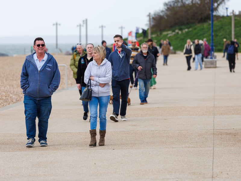 Walkers enjoy the new promenade on Saturday, April 4.