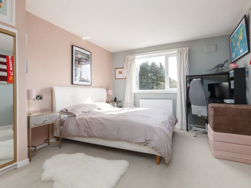 There are two further bedrooms including this good-sized room.