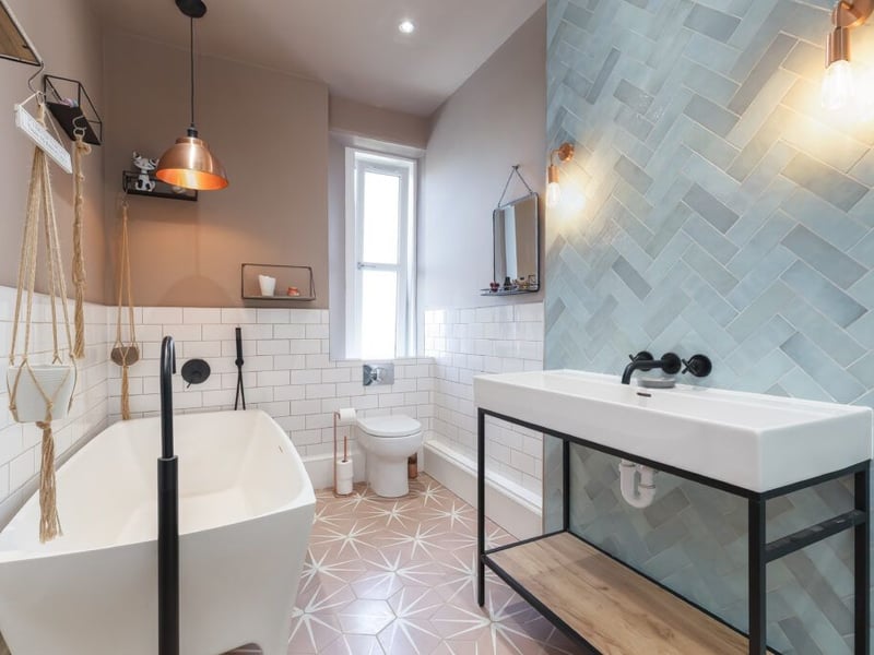 The stylish en-suite bathroom, with separate shower enclosure.