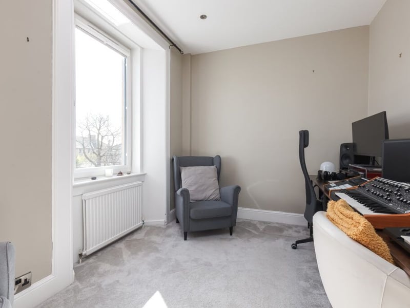 The third and final bedroom is currently used as an office, ideal for working from home.
