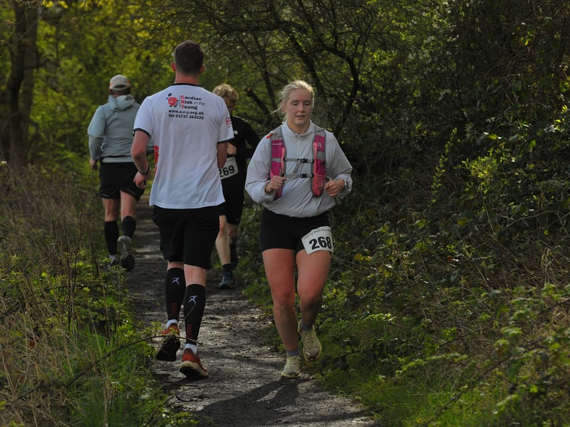 Runners at different stages of the course crossover.