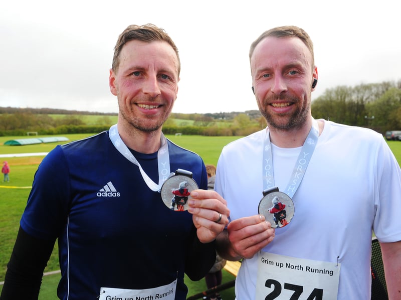Brothers David and Jordan Hood who were first and second in the half marathon.