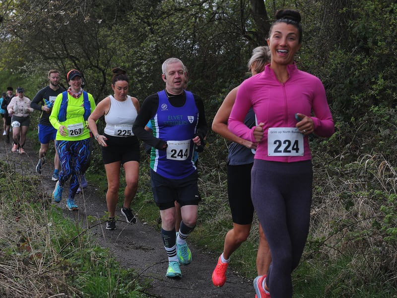Happy runners battle through.