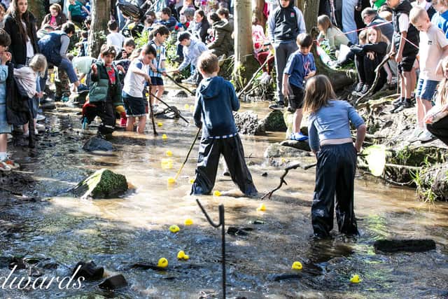Families enjoying the day at the friends of Porter Valley Duck Race at Endcliffe Park