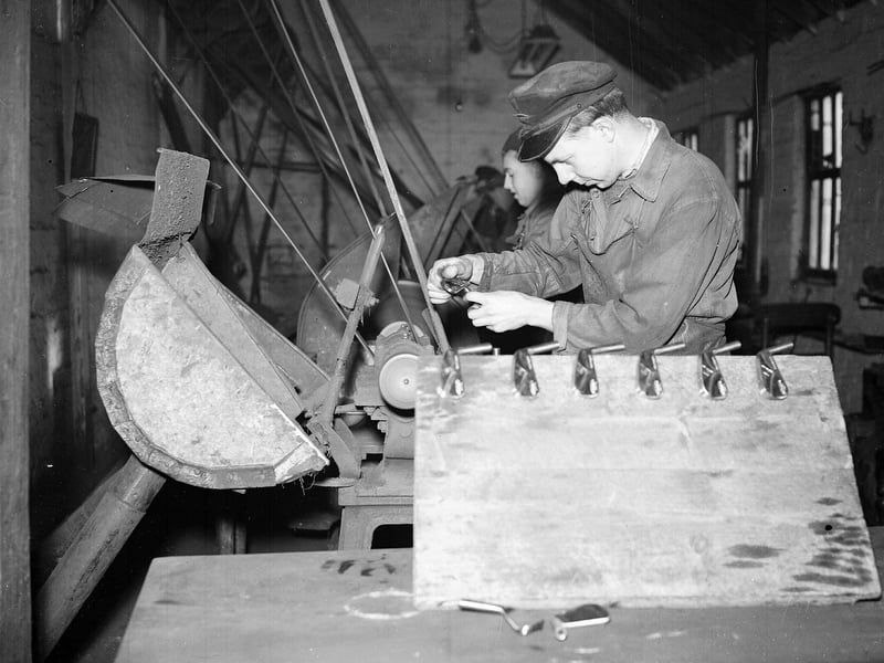 Alex Wilson making golf club heads at Anstruther's  Golf Iron Works in February 1954.