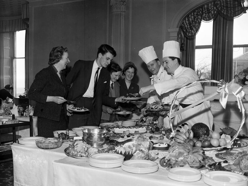 Danish chefs serve food in Elie's Marine Hotel in December 1962.