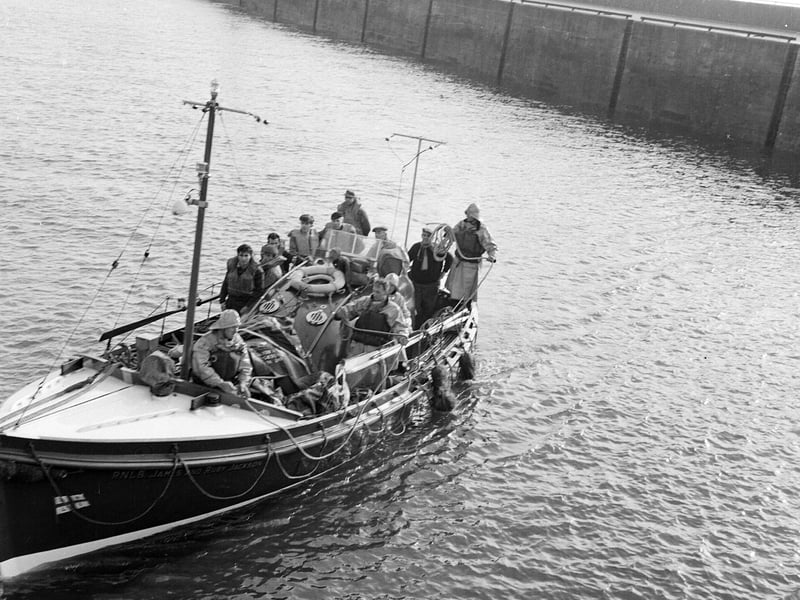A lifeboat sails into Crail in November 1962.