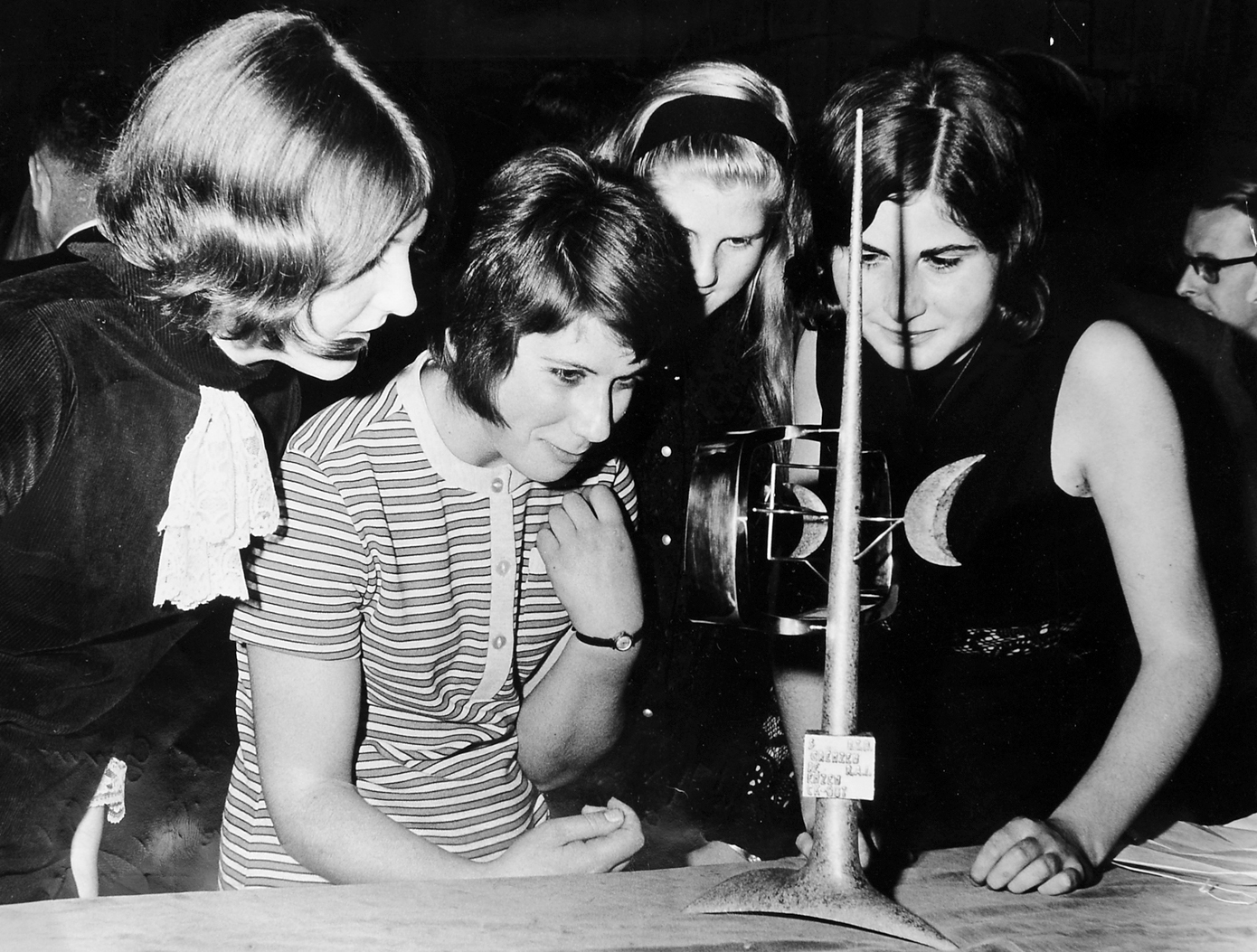 Members of Shrewsbury's “It’s a Knockout” team examining their winners’ trophy following their success in the European Jeux Sans Frontières competition. The team represented Great Britain in the final held at Blackpool on September 3, 1969, and went on to share the title with Wolfsburg, Germany. This image, taken on October 8, 1969, captures a civic reception at Shrewsbury Castle, where the team was celebrated for their achievement. Their journey began earlier that year with a qualifying heat at the Quarry in Shrewsbury on May 18, 1969.