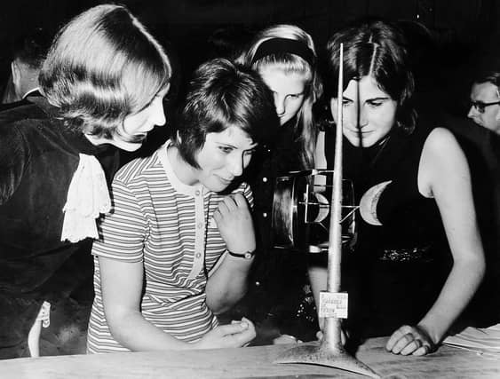 Members of Shrewsbury's “It’s a Knockout” team examining their winners’ trophy following their success in the European Jeux Sans Frontières competition. The team represented Great Britain in the final held at Blackpool on September 3, 1969, and went on to share the title with Wolfsburg, Germany. This image, taken on October 8, 1969, captures a civic reception at Shrewsbury Castle, where the team was celebrated for their achievement. Their journey began earlier that year with a qualifying heat at the Quarry in Shrewsbury on May 18, 1969.