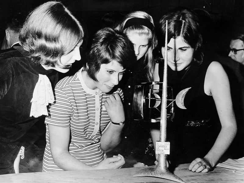Members of Shrewsbury's “It’s a Knockout” team examining their winners’ trophy following their success in the European Jeux Sans Frontières competition. The team represented Great Britain in the final held at Blackpool on September 3, 1969, and went on to share the title with Wolfsburg, Germany. This image, taken on October 8, 1969, captures a civic reception at Shrewsbury Castle, where the team was celebrated for their achievement. Their journey began earlier that year with a qualifying heat at the Quarry in Shrewsbury on May 18, 1969.