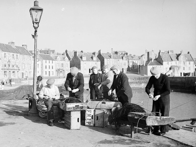 Pittenweem fishermen repairing lines in October 1953.