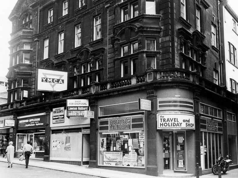 Albion Street showing the YMCA building, which was opened in 1908. The entrance is round the corner on Albion Place. Shops occupying the ground floor are Raymond Appleson opticians, a vacant shop and Hunting Lambert travel agents. Pictured in June 1984.
