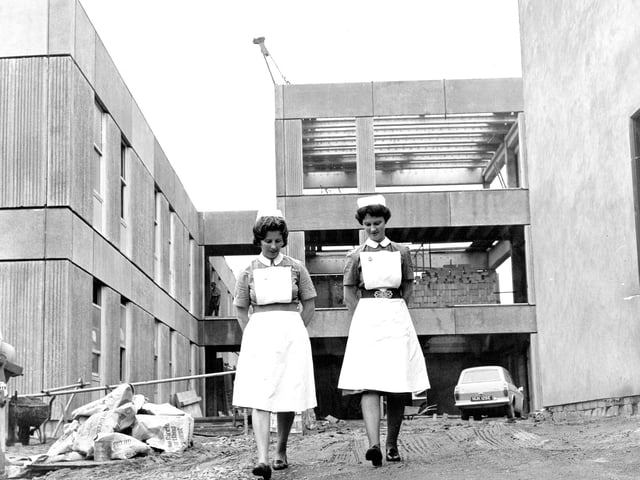 A nostalgia picture from Ludlow, dated October 1969, shows East Hamlet Hospital during the first £250,000 phase of its redevelopment, which was beginning to change the town’s skyline. Pictured are Nurse G Lucas and Staff Nurse M Capper walking past the new geriatric ward under construction, which was set to accommodate 66 patients. The hospital itself had evolved from the town’s former workhouse.