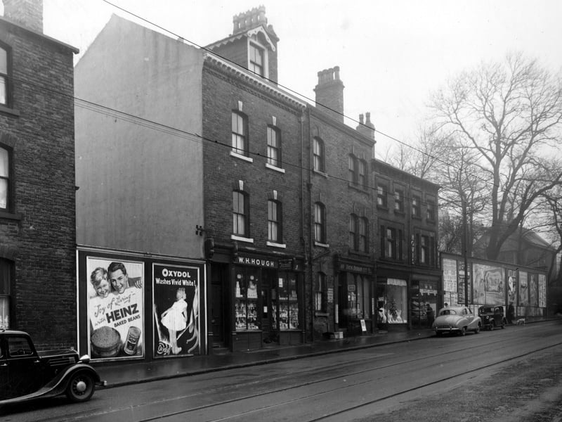 Shops on the west side of Harrogate Road in December 1954. They are, from left, 'W.H.Hough, Chemist', 'T.Durkin, Grocer', 'Unknown', 'Ainsleys Bakery'.