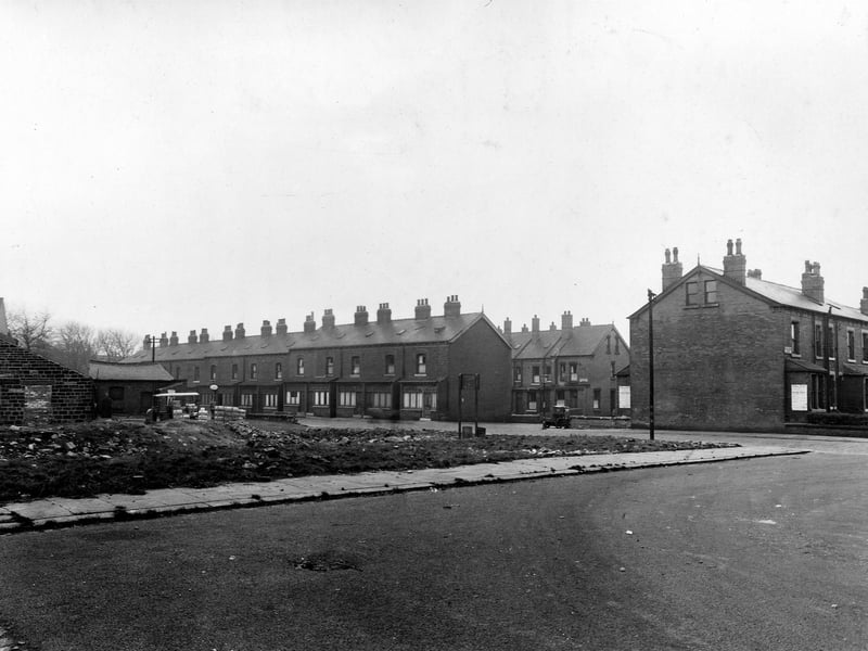 Looking south at Seaforth Road from Trafford Grove in November 1948. On the right are the junctions with Strathmore Street (right), and Trafford Terrace (left). On the left of the photo is Harehills garage.