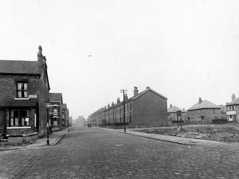 Looking north-west down Seaforth Road in November 1948. On the left are the junctions with Trafford Terrace, Strathmore Street and Strathmore View. Behind some waste land, on the right, is Trafford Grove.