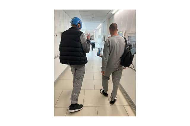 Logan pictured in hospital after the crash