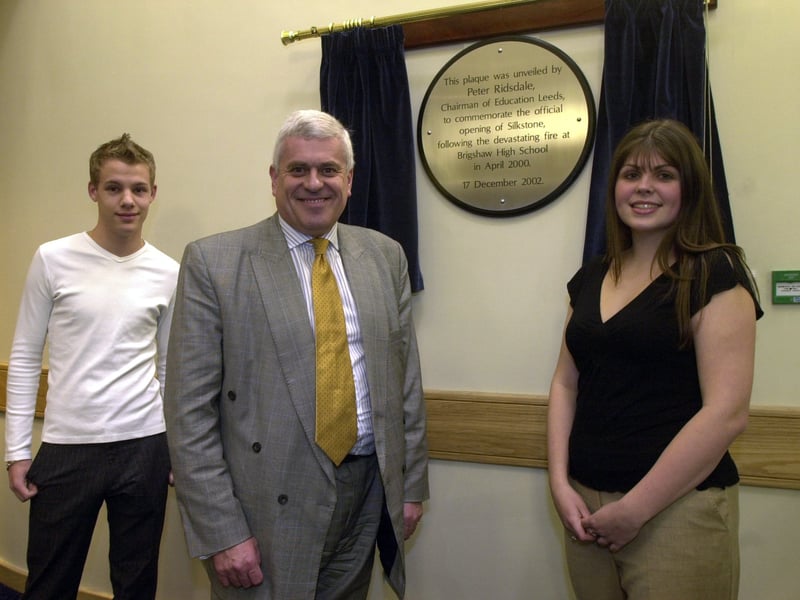 Chairman of Education Leeds, Peter Ridsdale opened the new £8 million school building at Brigshaw High in December 2002. He is pictured with students Charlotte Orr and Matt Hill.