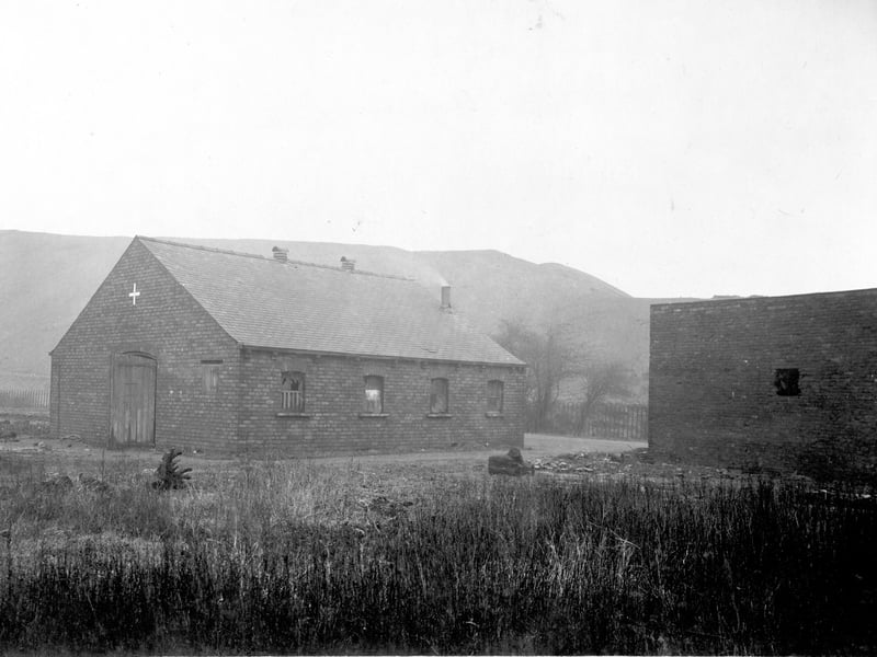 An outbuilding Torre Cottage off Torre Road in November 1929.  In the background industrial waste, the York Road Iron and Coal Company operated in this area.