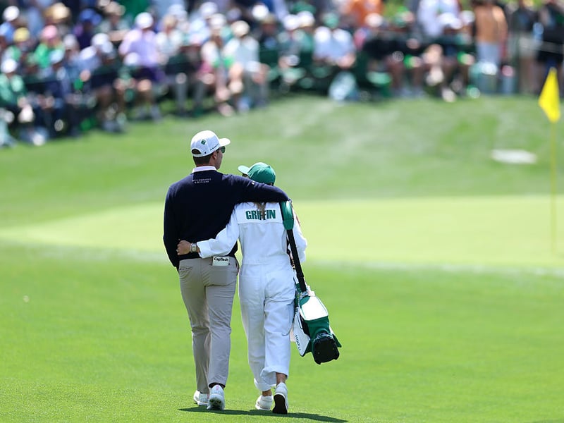Ben Griffin of the United States walks with his wife Dana Griffin.
