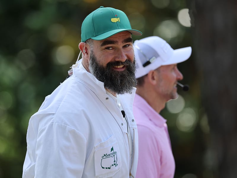 Jason Kelce, broadcaster for ESPN, walks the course during the Par Three Contest.