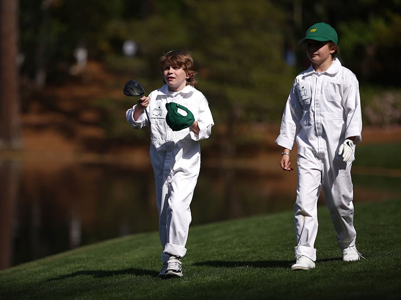 Franklin Fleetwood and Iris Lowry walk to the ninth green.
