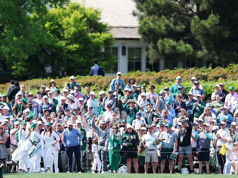 Tommy Fleetwood of England celebrates a hole-in-one on the third hole.