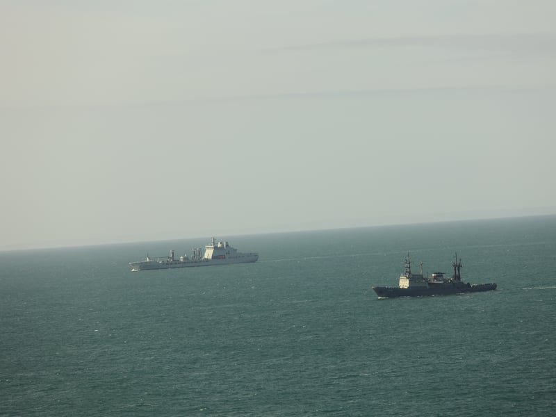 RFA Tideforce on monitoring duties with Russian tug Altay in the foreground
