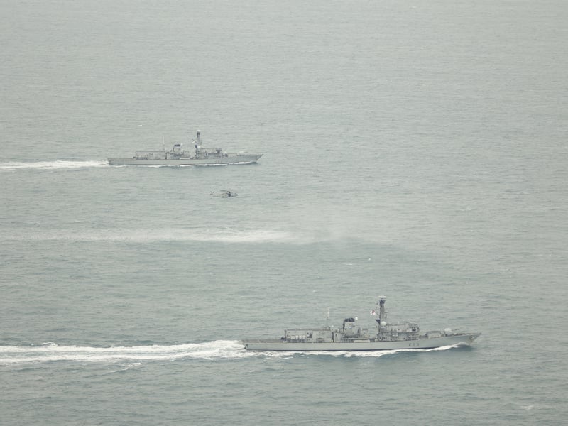 HMS St Albans nearest and HMS Somerset in the background with 814NAS Merlin helicopter in between