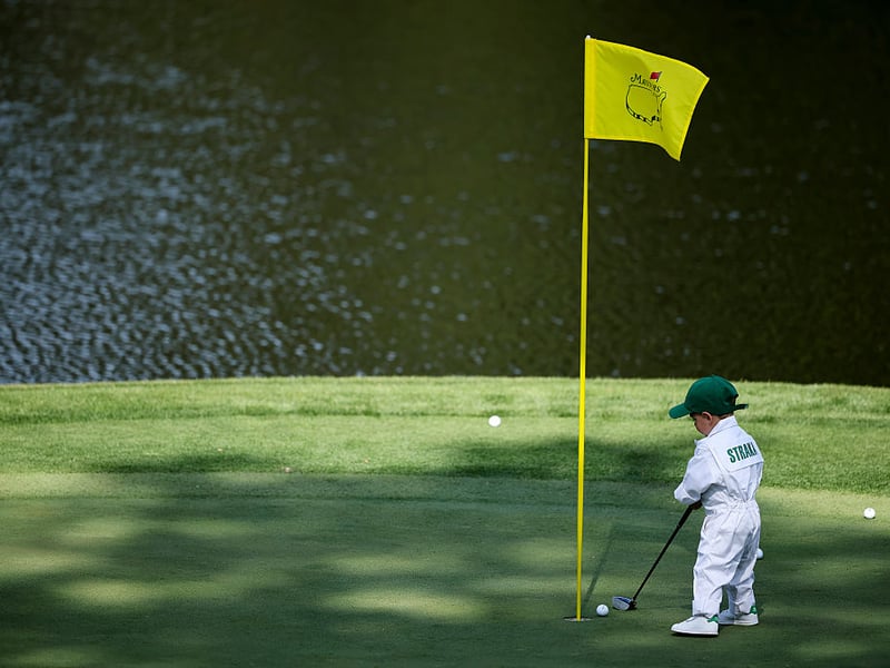 Leo Straka, son of Sepp Straka of Austria, putts on the ninth green.