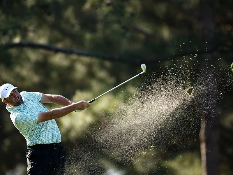 Scottie Scheffler of the United States plays a shot on the 14th hole.