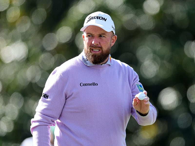 Shane Lowry of Ireland reacts after a birdie on the first green.
