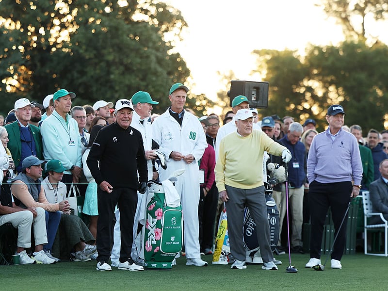 Honorary Starters Gary Player, Tom Watson and Jack Nicklaus look on from the first tee.