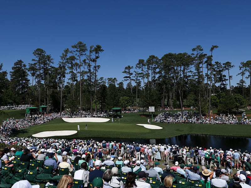 Bryson DeChambeau of the United States walks onto the 16th green.