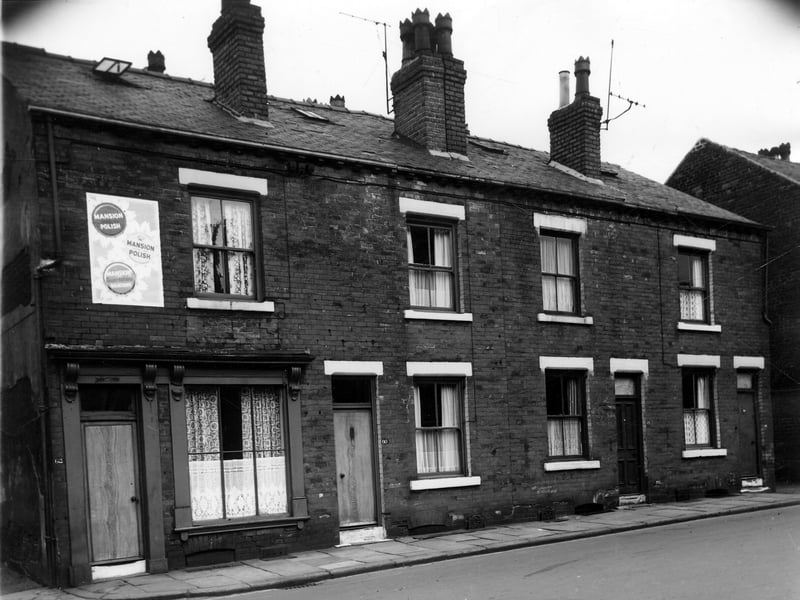 A row of houses on Joseph Street, these were through houses with yards to the rear. Pictured in June 1964.